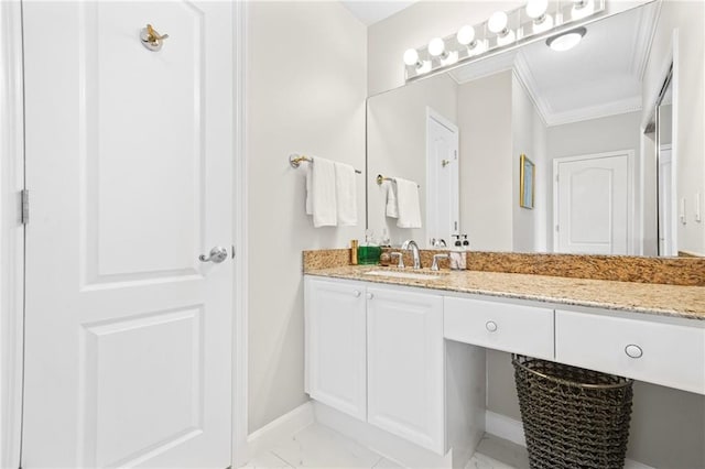 3475 Oak Valley Rd NE Unit 950, Atlanta, GA 30326 - bathroom with baseboards, ornamental molding, vanity, and marble look tile flooring