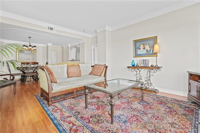 3475 Oak Valley Rd NE Unit 950, Atlanta, GA 30326 - living room with wood finished floors, ornamental molding, and baseboards