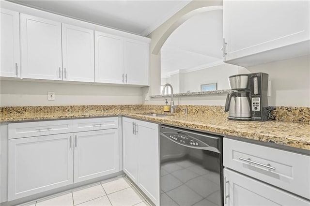 3475 Oak Valley Rd NE Unit 950, Atlanta, GA 30326 - kitchen featuring black dishwasher, ornamental molding, a sink, light tile patterned floors, and white cabinetry