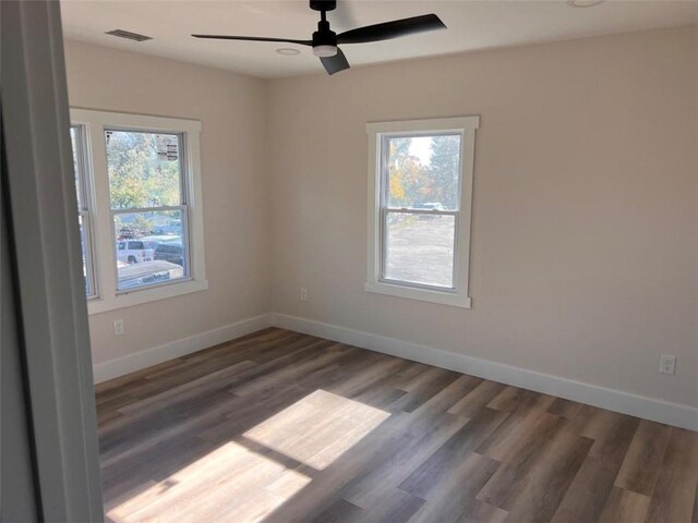 doorway with baseboards, ornamental molding, wood finished floors, and french doors