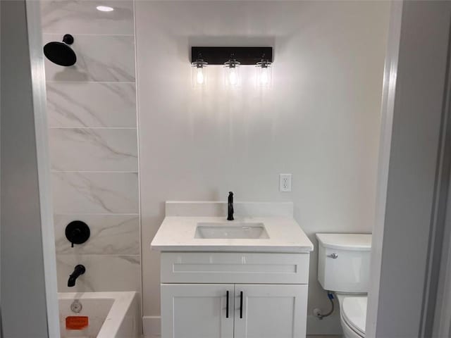 full bath with toilet,  shower combination, and vanity