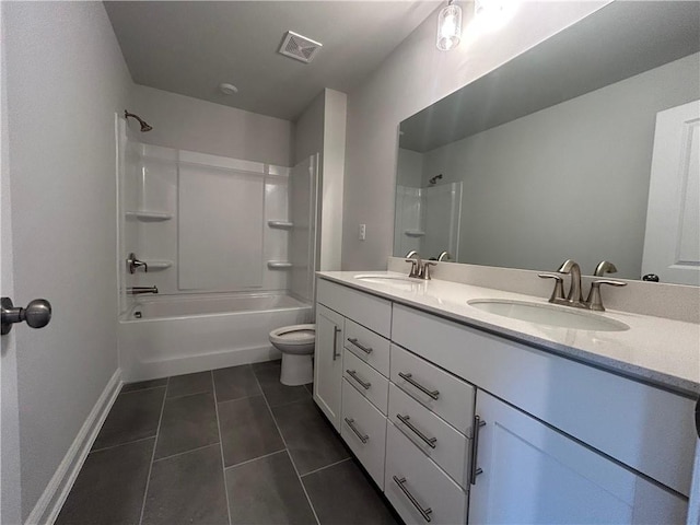 full bathroom featuring double vanity, a sink, visible vents, and tile patterned floors