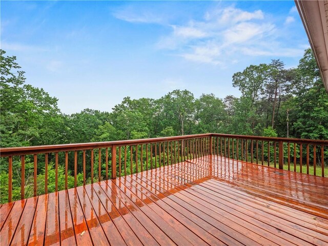 205 Crooked Pine Trl, Baldwin, GA 30511 - wooden deck featuring a forest view