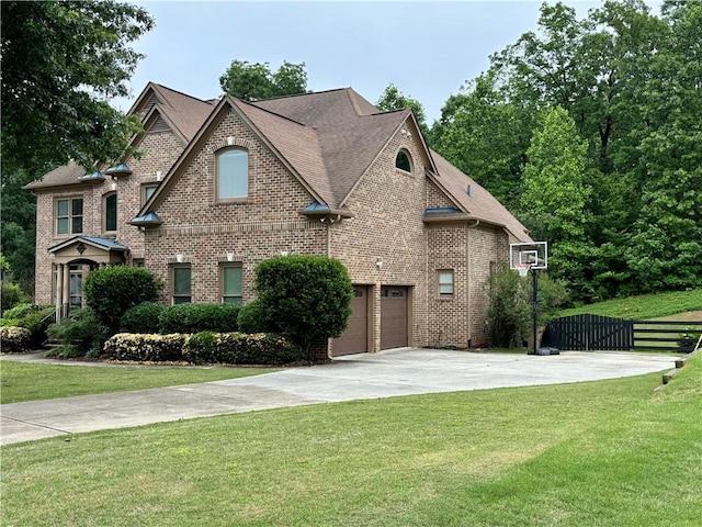 602 Davenport Pl, Canton, GA 30115 - view of front facade with driveway, brick siding, a garage, and roof with shingles