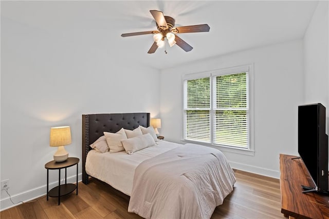 602 Davenport Pl, Canton, GA 30115 - bedroom featuring baseboards, wood finished floors, and ceiling fan