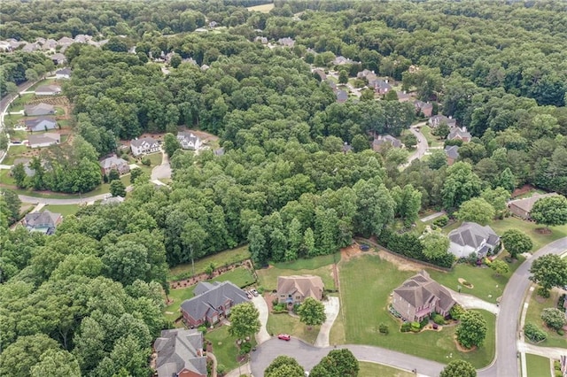 602 Davenport Pl, Canton, GA 30115 - aerial overview of property's location with nearby suburban area and a forest