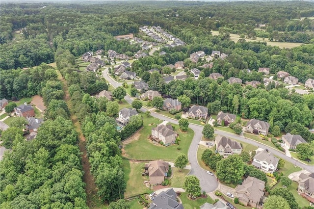 602 Davenport Pl, Canton, GA 30115 - aerial view of property and surrounding area featuring nearby suburban area and a heavily wooded area