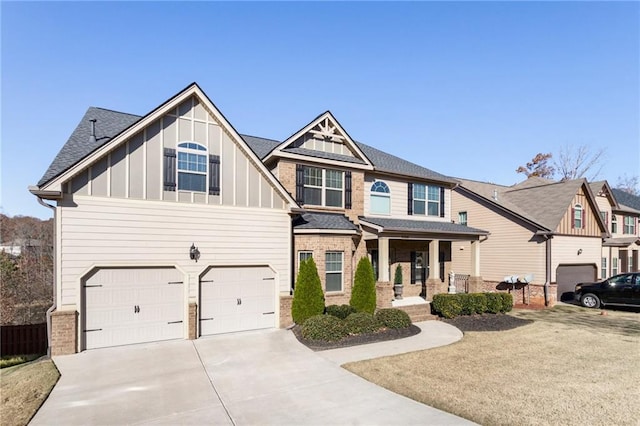 craftsman house with covered porch and a garage