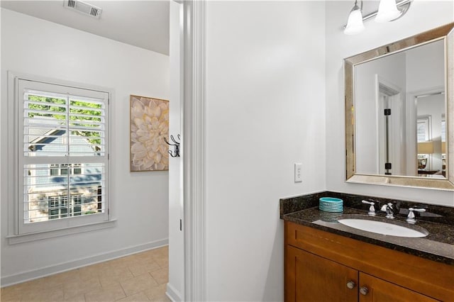 bathroom featuring vanity and tile patterned floors