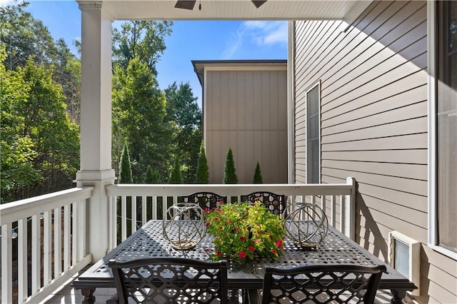 wooden deck with ceiling fan