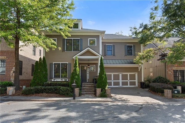 view of front of property featuring a garage