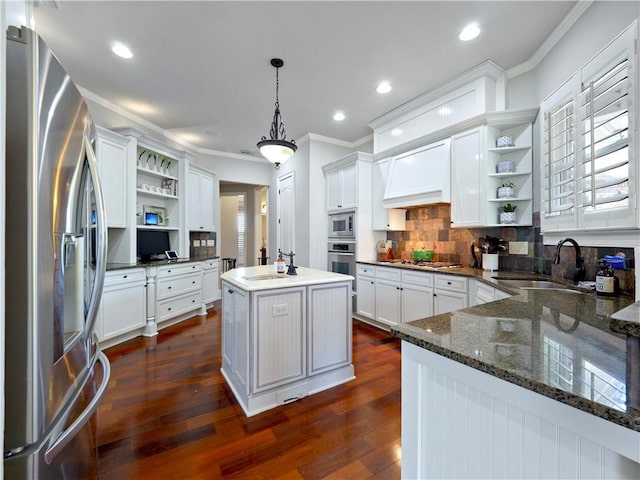 kitchen featuring open shelves, a sink, appliances with stainless steel finishes, and ornamental molding