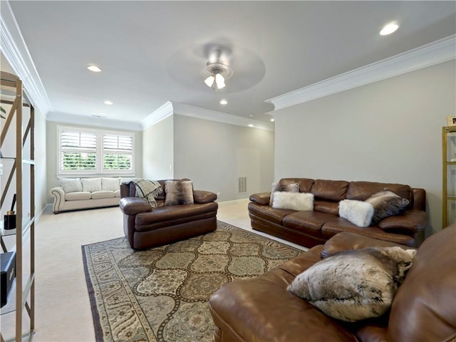 living area featuring crown molding, baseboards, visible vents, and carpet