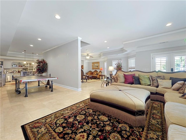 living room featuring ornamental molding, baseboards, ceiling fan, recessed lighting, and light tile patterned floors