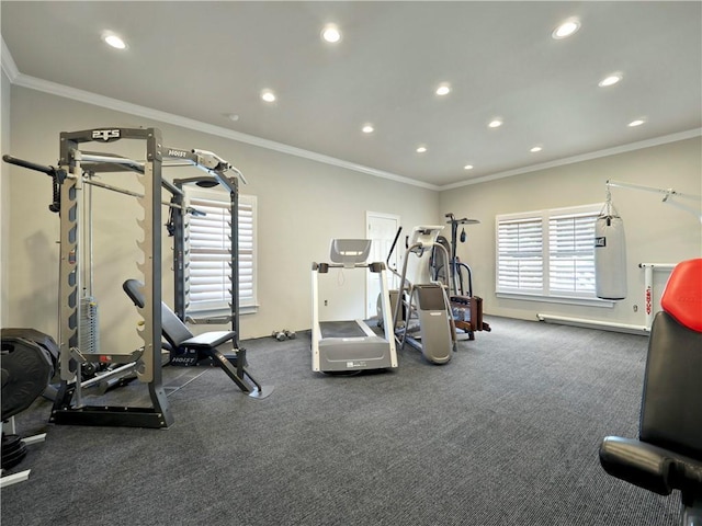 workout room featuring ornamental molding and recessed lighting