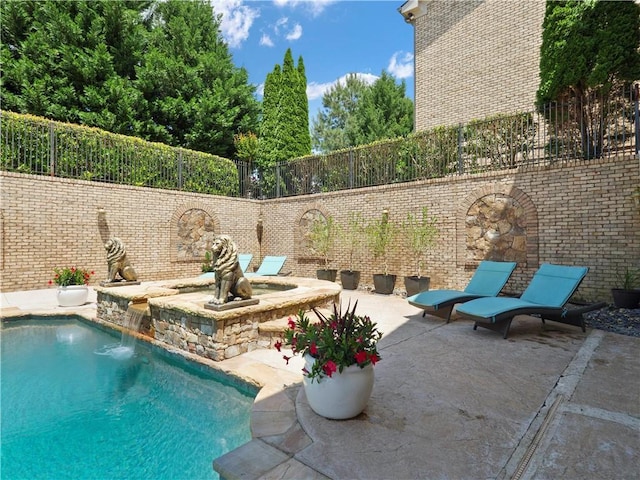view of swimming pool featuring fence, a fenced in pool, and a patio area