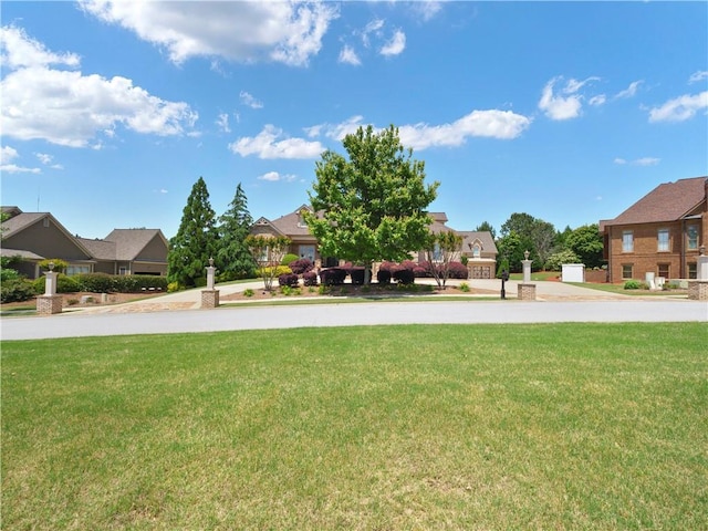 view of yard featuring a residential view