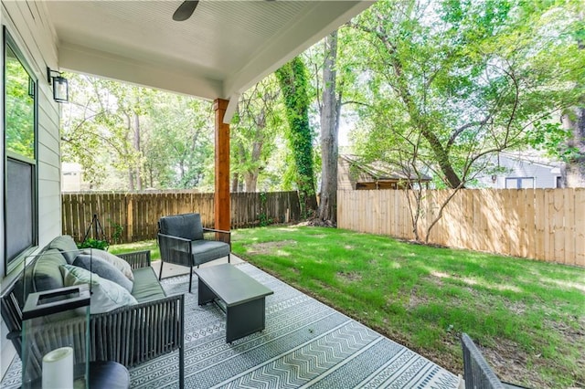 view of patio / terrace featuring a fenced backyard, an outdoor hangout area, and a ceiling fan
