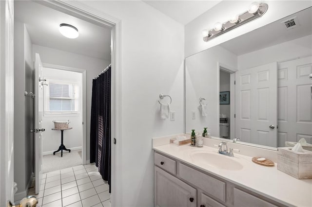 bathroom with vanity and tile patterned floors