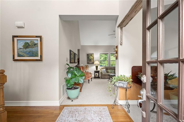 hallway featuring hardwood / wood-style flooring