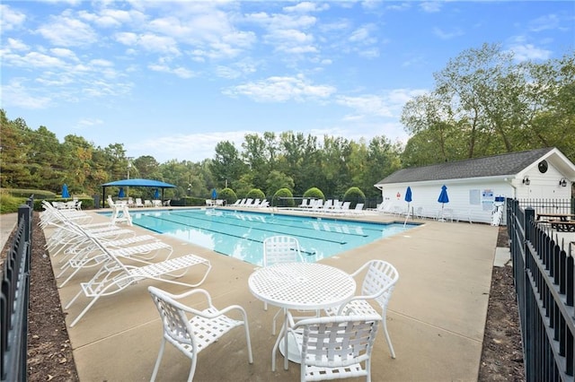 view of swimming pool featuring a patio