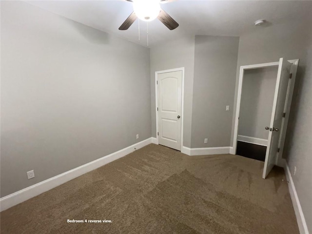 unfurnished bedroom featuring a ceiling fan, baseboards, and carpet floors