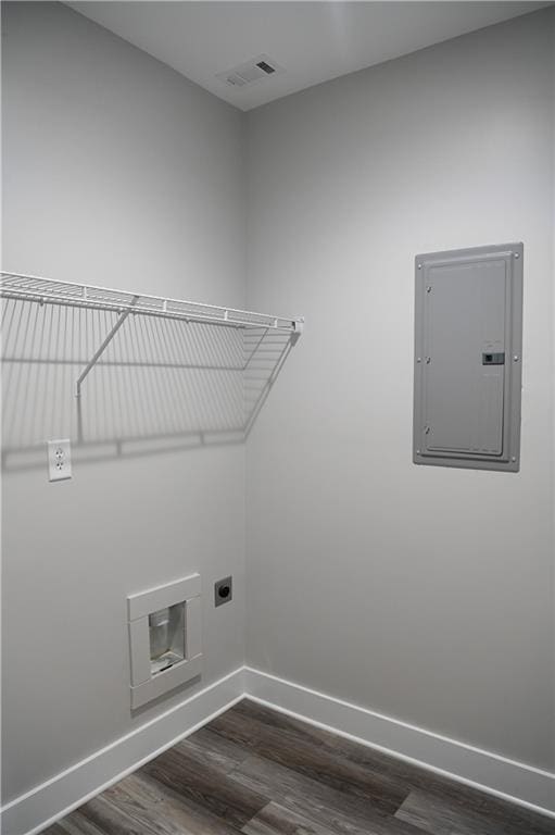 107 Church St SE, Ranger, GA 30734 - laundry room featuring laundry area, electric panel, electric dryer hookup, baseboards, and dark wood-type flooring