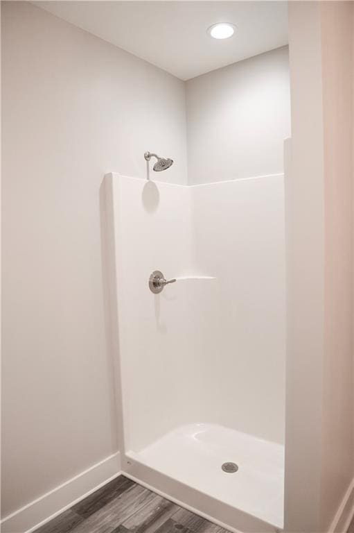 107 Church St SE, Ranger, GA 30734 - bathroom with baseboards, walk in shower, and wood finished floors