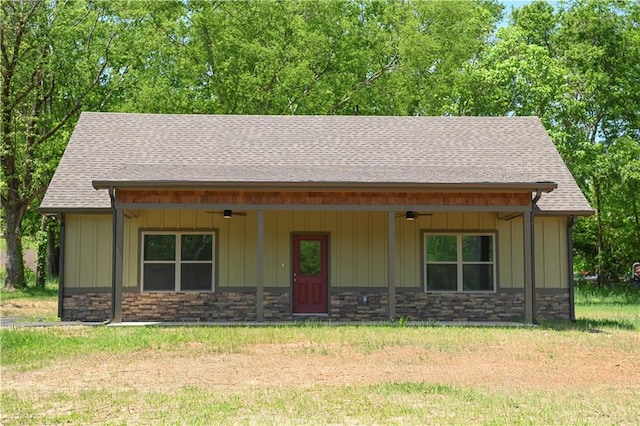 107 Church St SE, Ranger, GA 30734 - view of front of property featuring board and batten siding, roof with shingles, ceiling fan, and stone siding