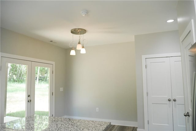 107 Church St SE, Ranger, GA 30734 - unfurnished dining area featuring french doors, recessed lighting, baseboards, and wood finished floors