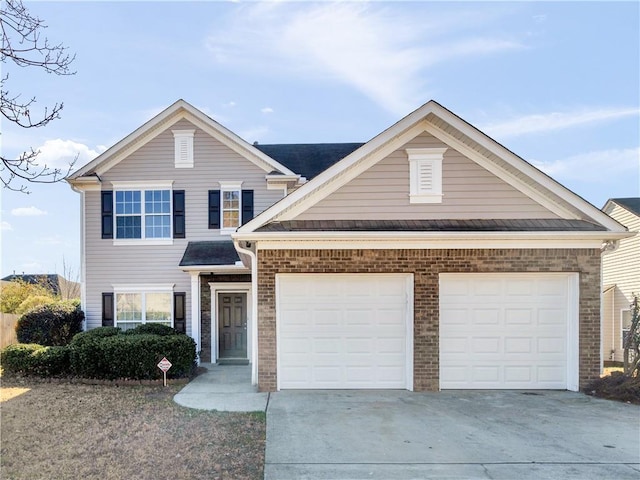 view of front of property with a garage