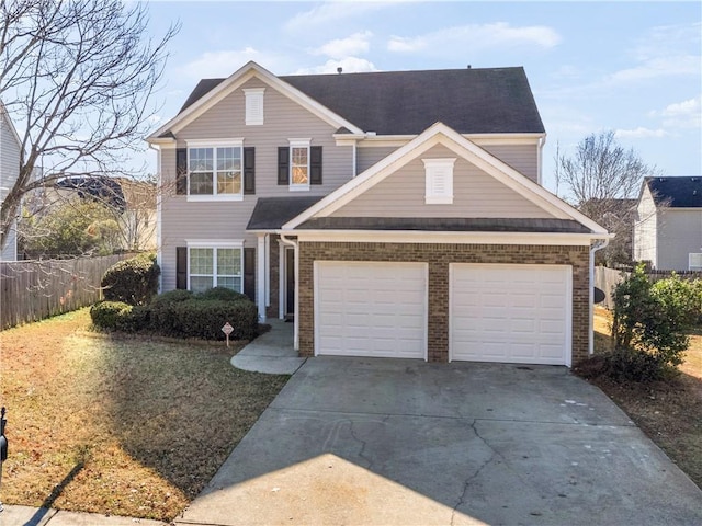 view of front of property with a garage