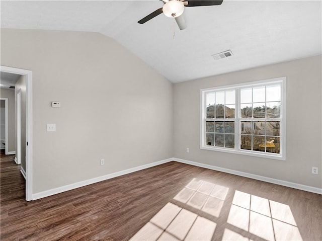 unfurnished room with ceiling fan, wood-type flooring, and vaulted ceiling