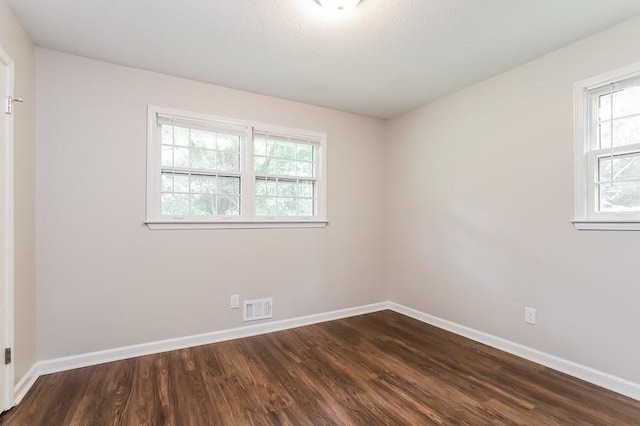 4820 Oak Grove Dr, Cumming, GA 30040 - empty room featuring dark wood-style flooring and baseboards