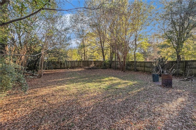 view of yard with a fenced backyard