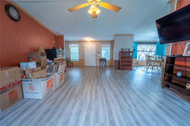 735 Hale Rd, Maysville, GA 30558 - living area featuring wood finished floors, a ceiling fan, and crown molding