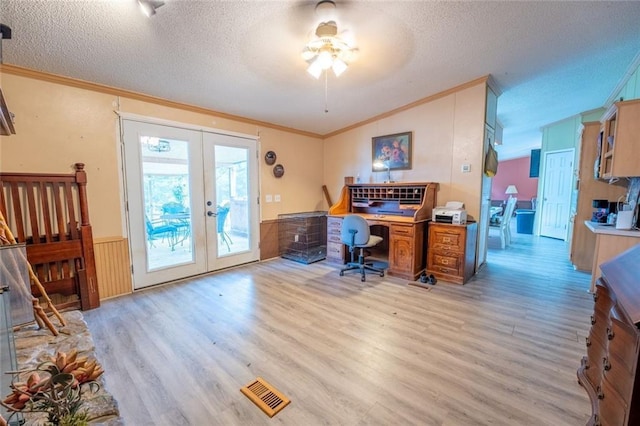 735 Hale Rd, Maysville, GA 30558 - office area featuring french doors, ornamental molding, light wood-type flooring, a textured ceiling, and a wainscoted wall