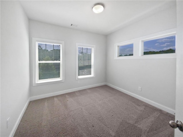 view of carpeted spare room