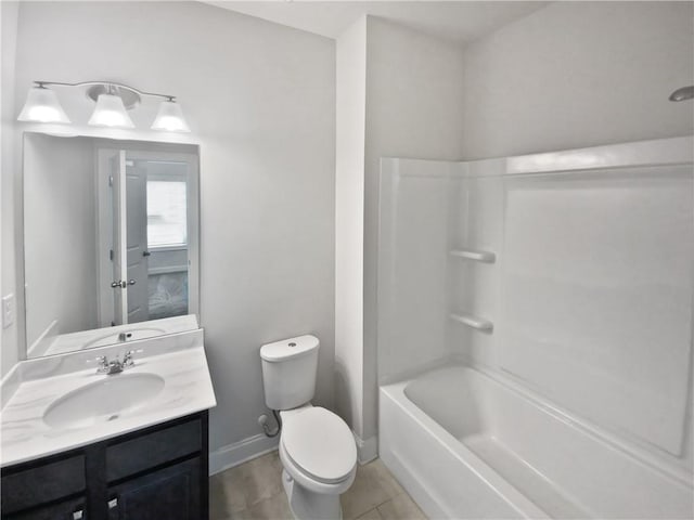 full bathroom featuring vanity, toilet, washtub / shower combination, and tile patterned floors