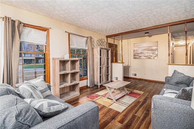5843 Foxfield Trl, Rex, GA 30273 - living area featuring wood finished floors, baseboards, and a textured ceiling