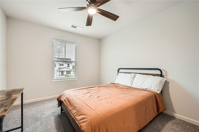 bedroom featuring visible vents, carpet flooring, and baseboards