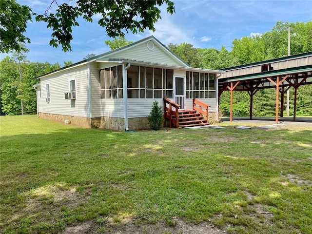 505 Sandhill Hickory Level Rd, Carrollton, GA 30116 - view of front of property featuring a sunroom, a front yard, and cooling unit