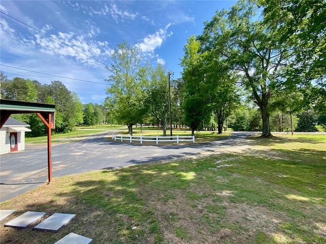 505 Sandhill Hickory Level Rd, Carrollton, GA 30116 - view of yard with view of wooded area