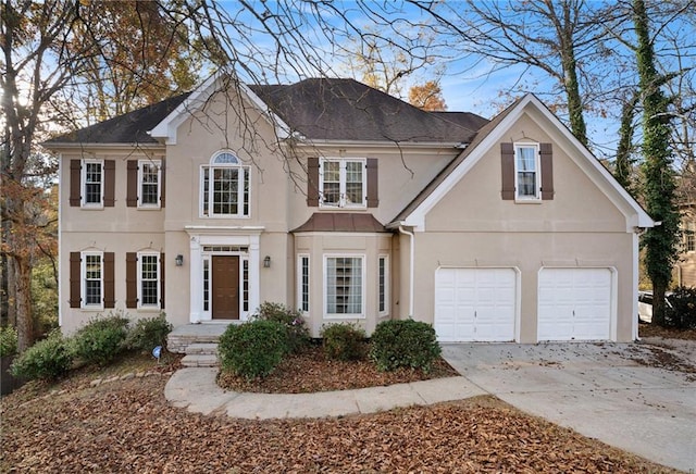 view of front of property with a garage