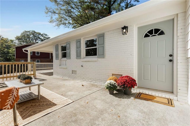 entrance to property with a porch