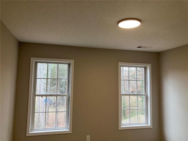 interior details with a textured ceiling