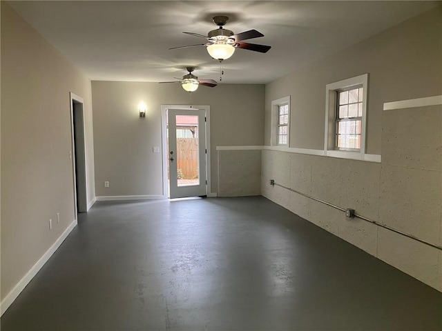 spare room featuring ceiling fan