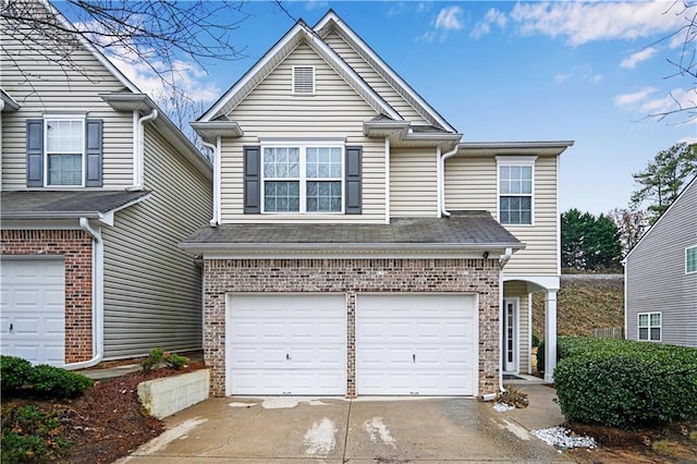 front of property featuring a garage