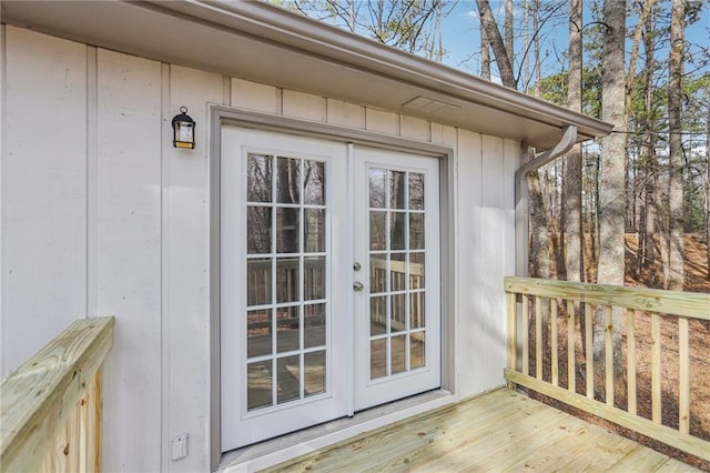 doorway to property featuring french doors and a deck