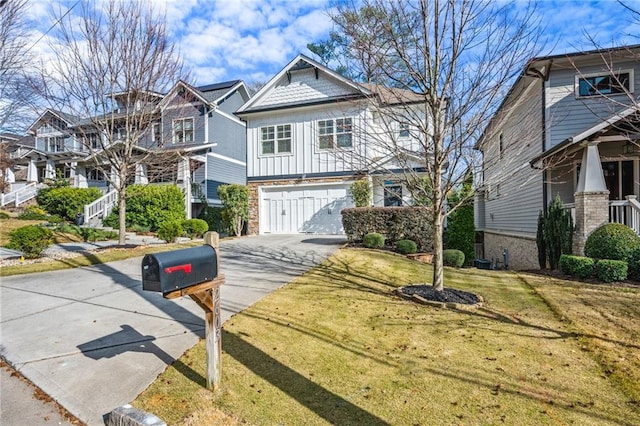 view of front of house with a front yard and a garage